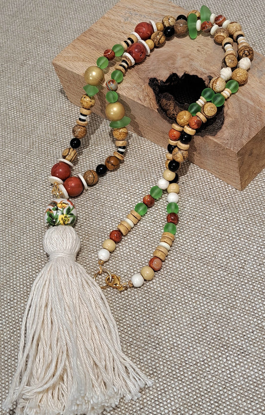 Ladies beach inspired tassel necklace with sea glass accents.