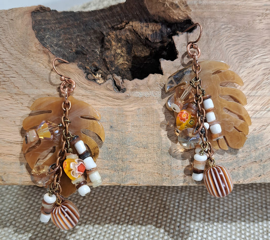 Ladies caramel acetate leaf earrings with vintage beads and copper chain dangles.