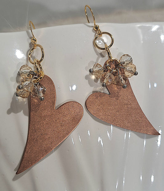 Ladies Copper heart earrings with crystals.