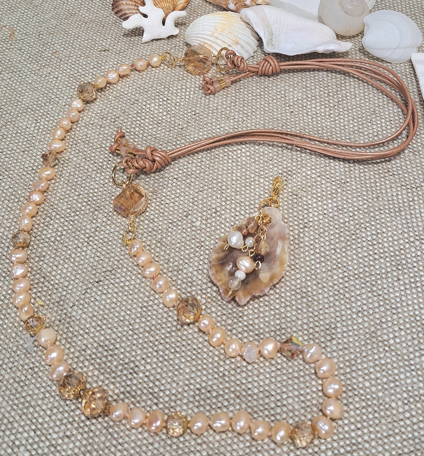 Ladies adjustable leather and strung fresh water pearl and crystal necklace.