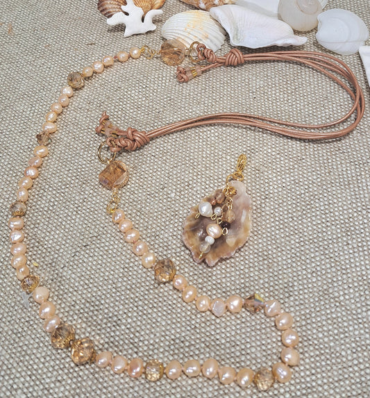 Ladies adjustable leather and strung fresh water pearl and crystal necklace.