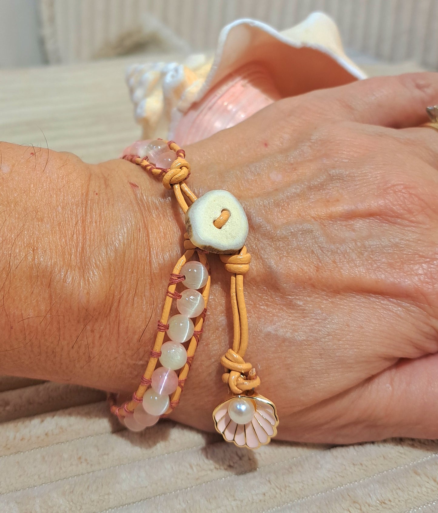 Ladies Selenite and leather ladder stitch bracelet with Shell charm