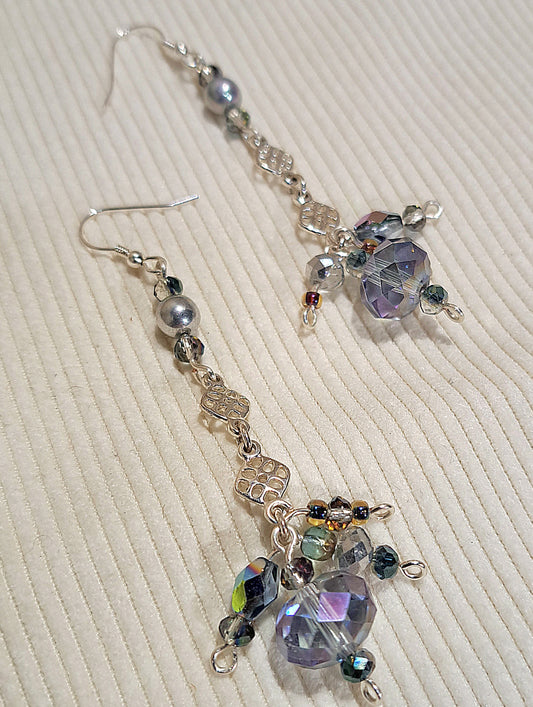 Ladies Dangle silver and lavender shaded cut crystal earrings.