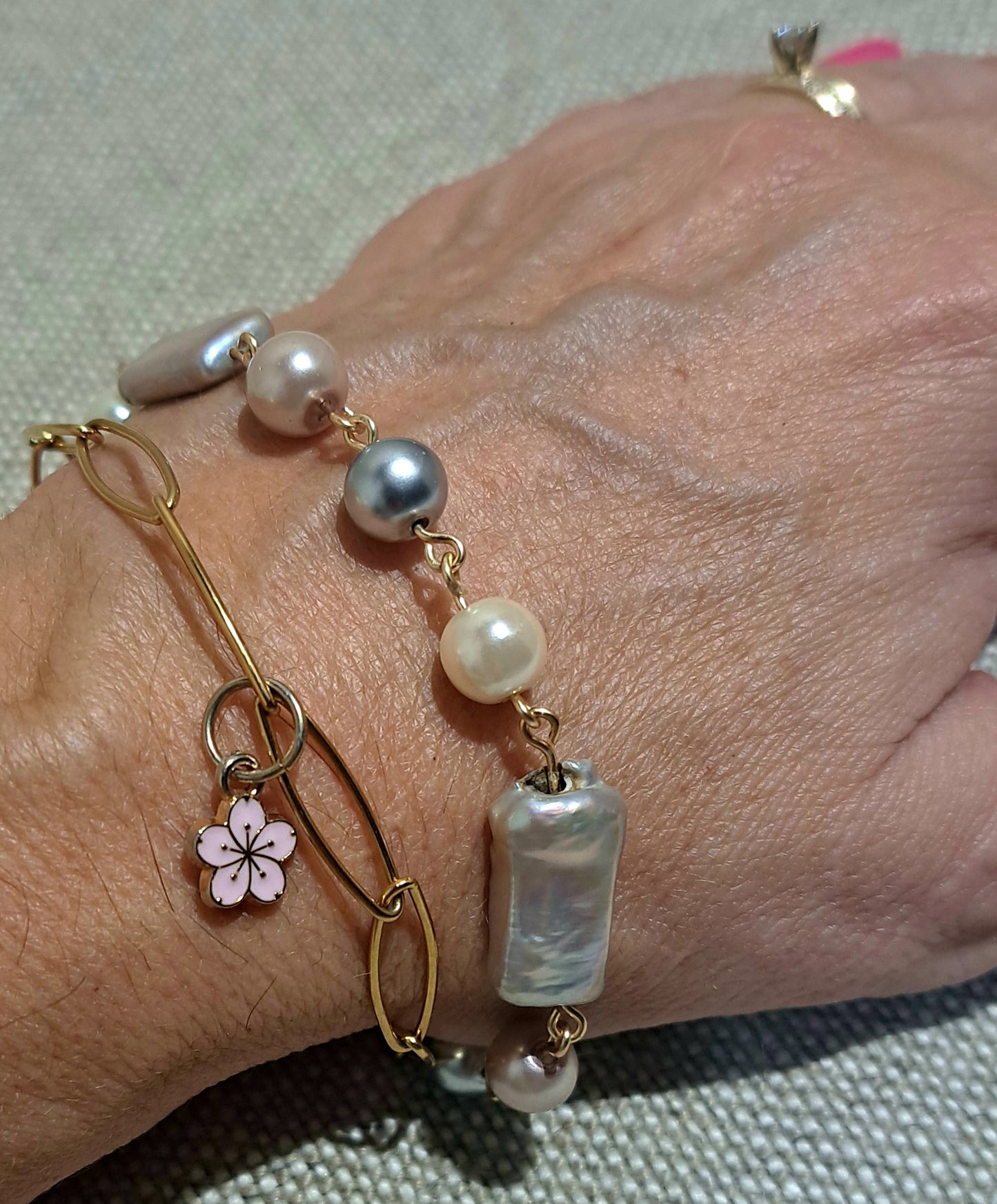 Ladies double strand paperclip chain and Biwa and mixed pearl bracelet.