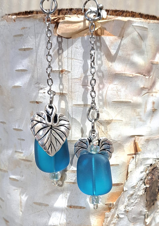Stainless Steel chain dangle earrings with blue  glass and steel leaf charm.