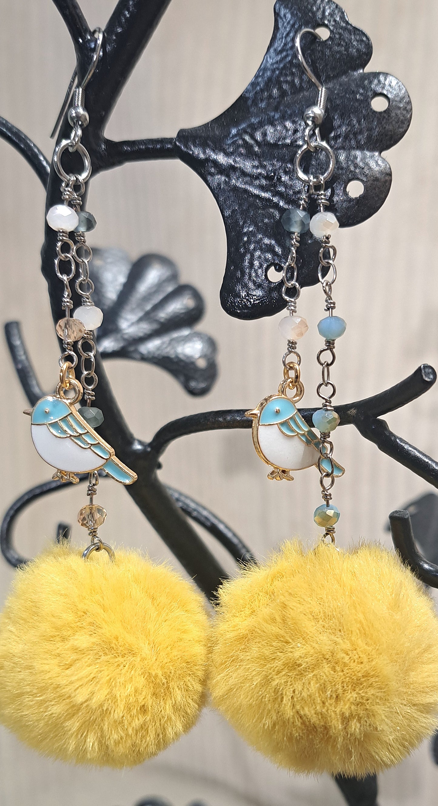 PomPom dangle earrings yellow with blue bird charm