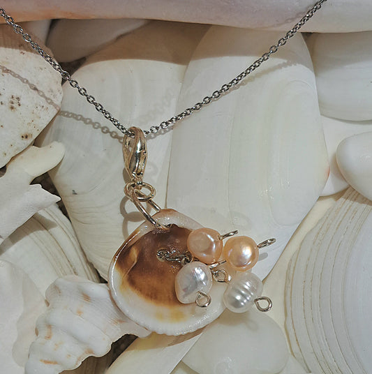 Sea Glass Shell pendant on gold chain with ivory and peach fresh water pearl dangles.