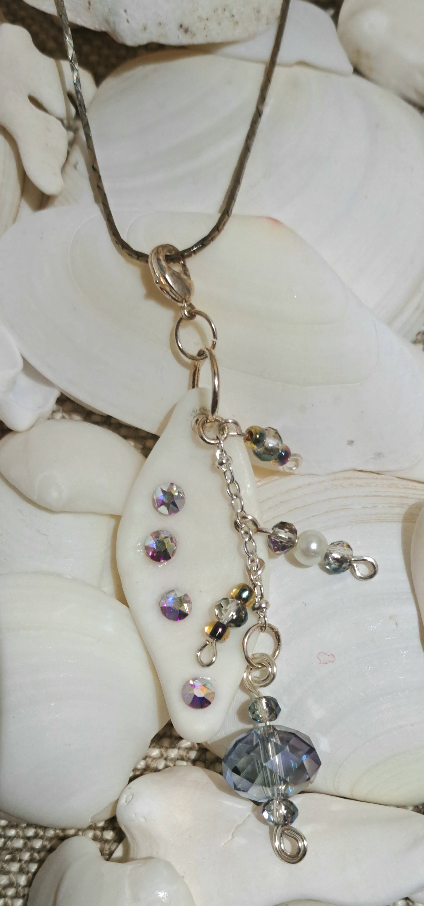 Sea shell Pendant withe Crystal chips and Mauve crystal vintage facetted beads.
