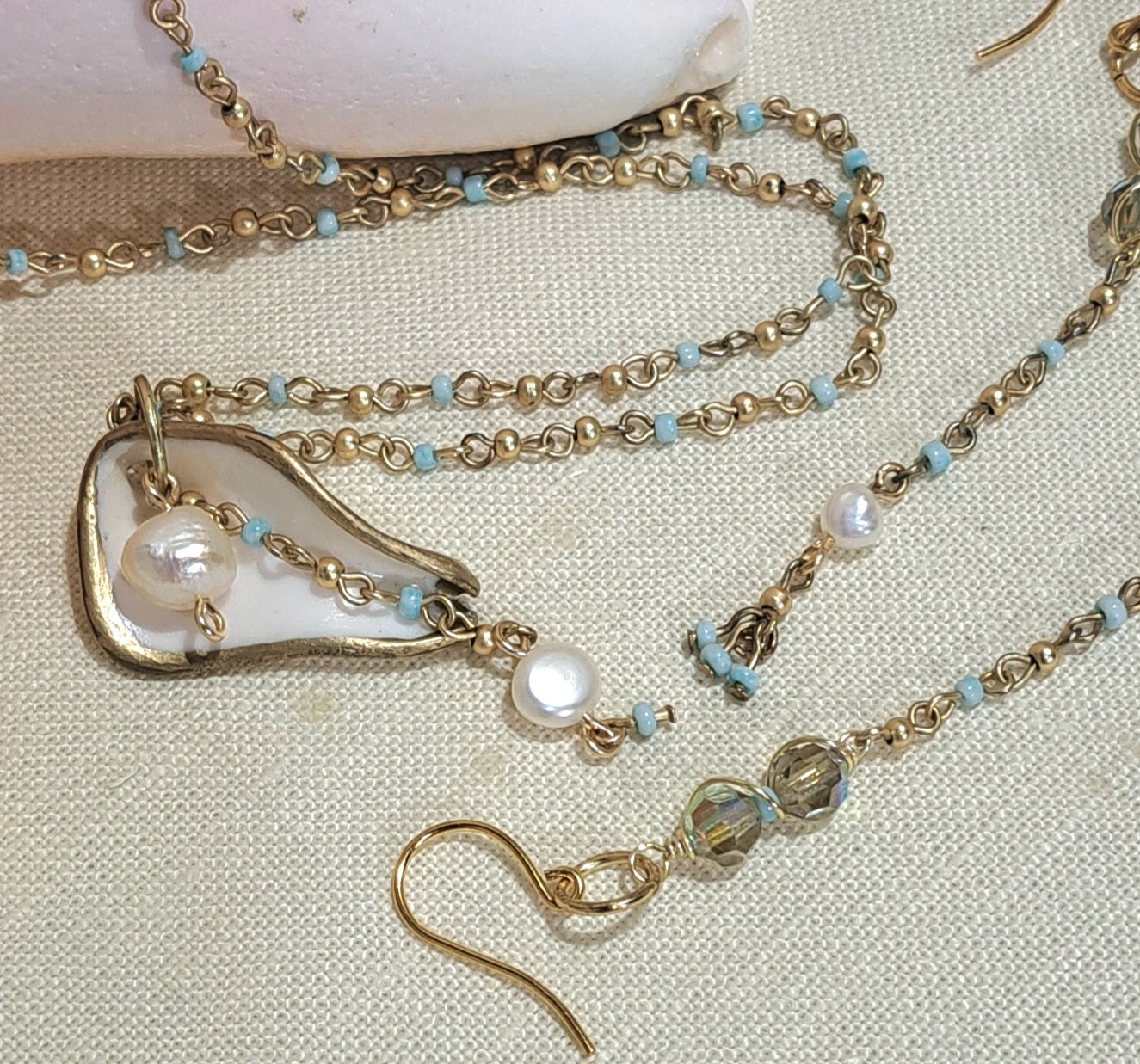 Sea Shell Necklace  and earring with embellished satellite chain and  fresh water pearl details