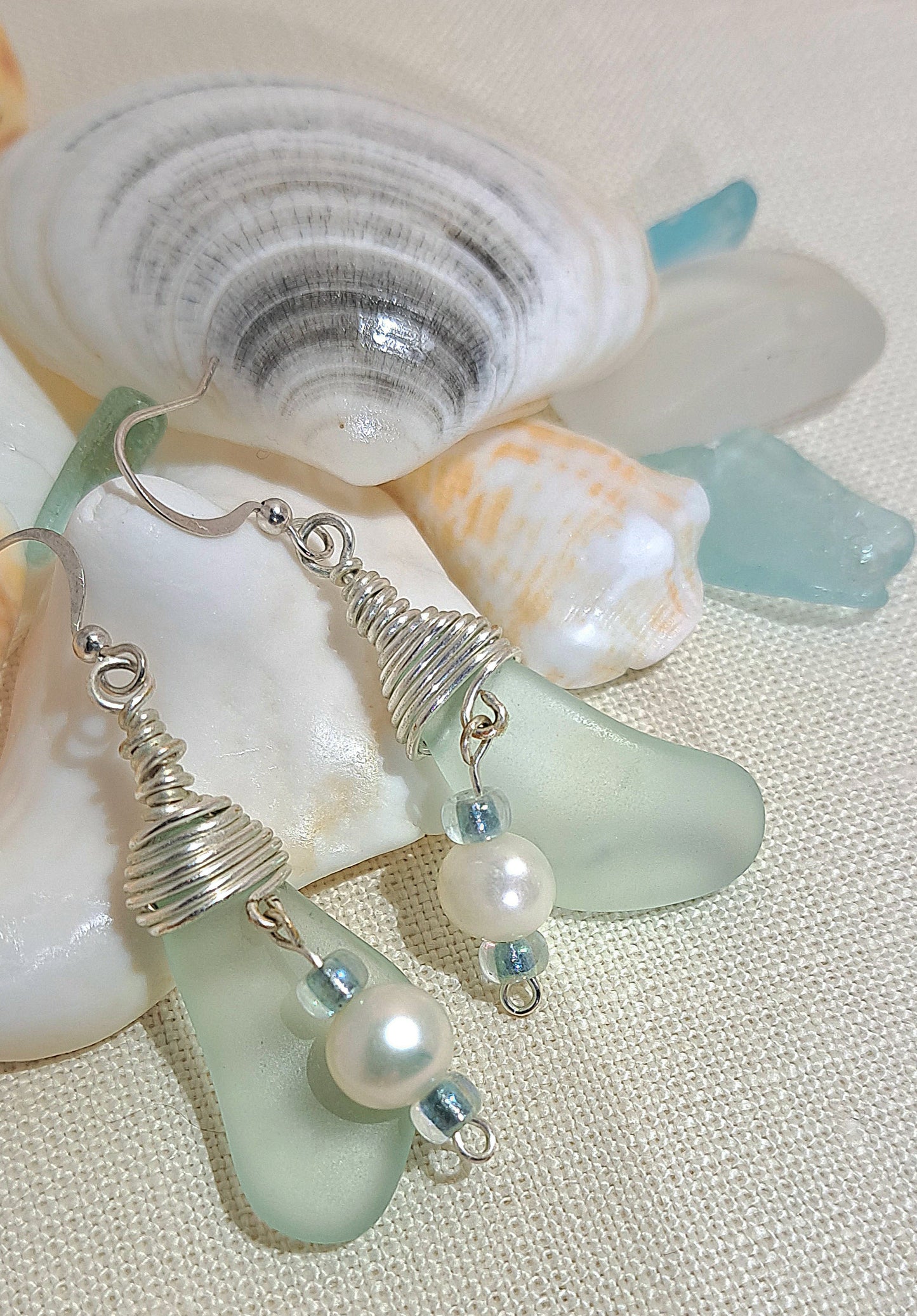 Ladies Sea glass silver wire wrapped drop earrings.