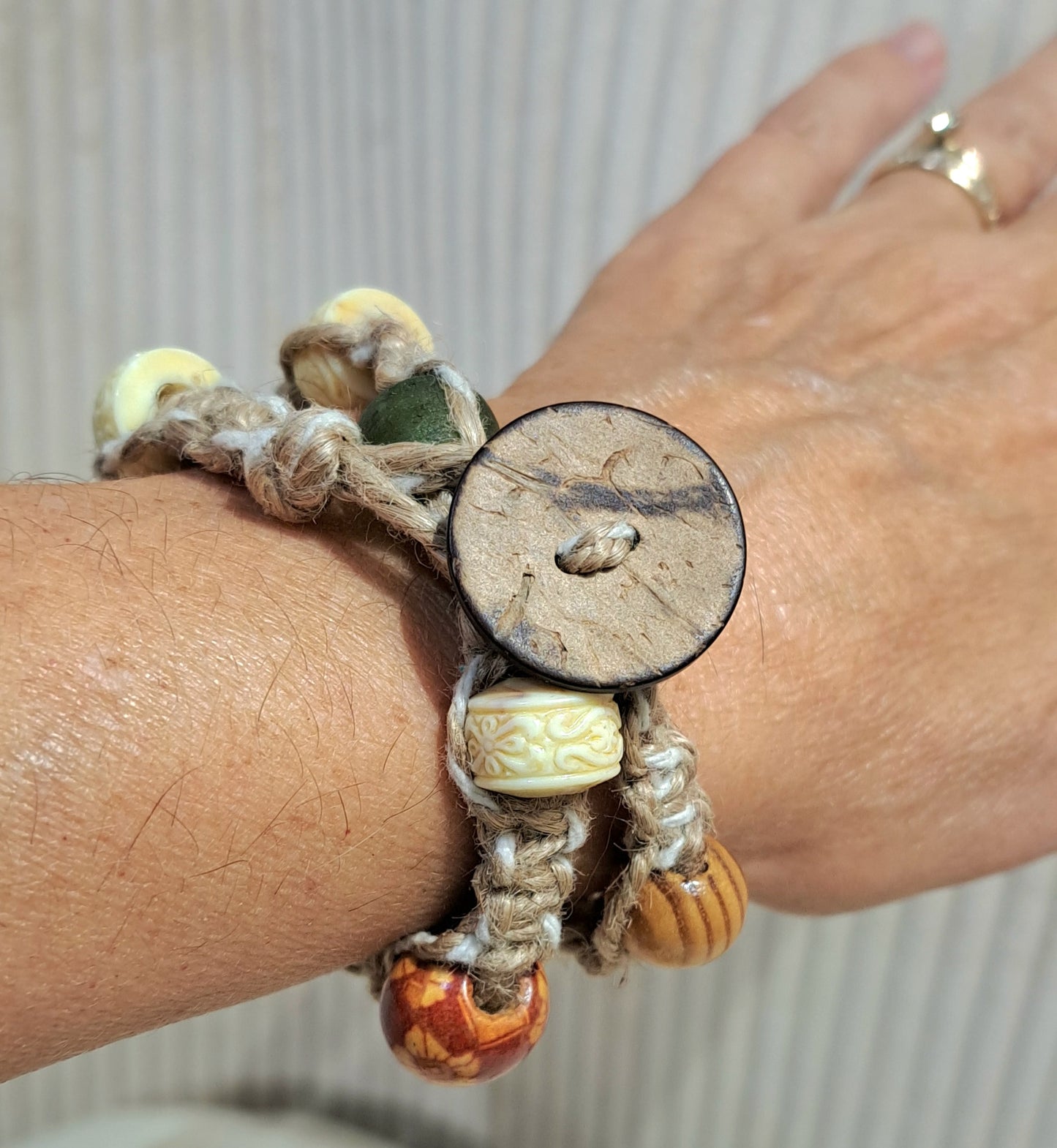 Natural double wrapped jute bracelet with African recycled glass and etched bakelite beads.