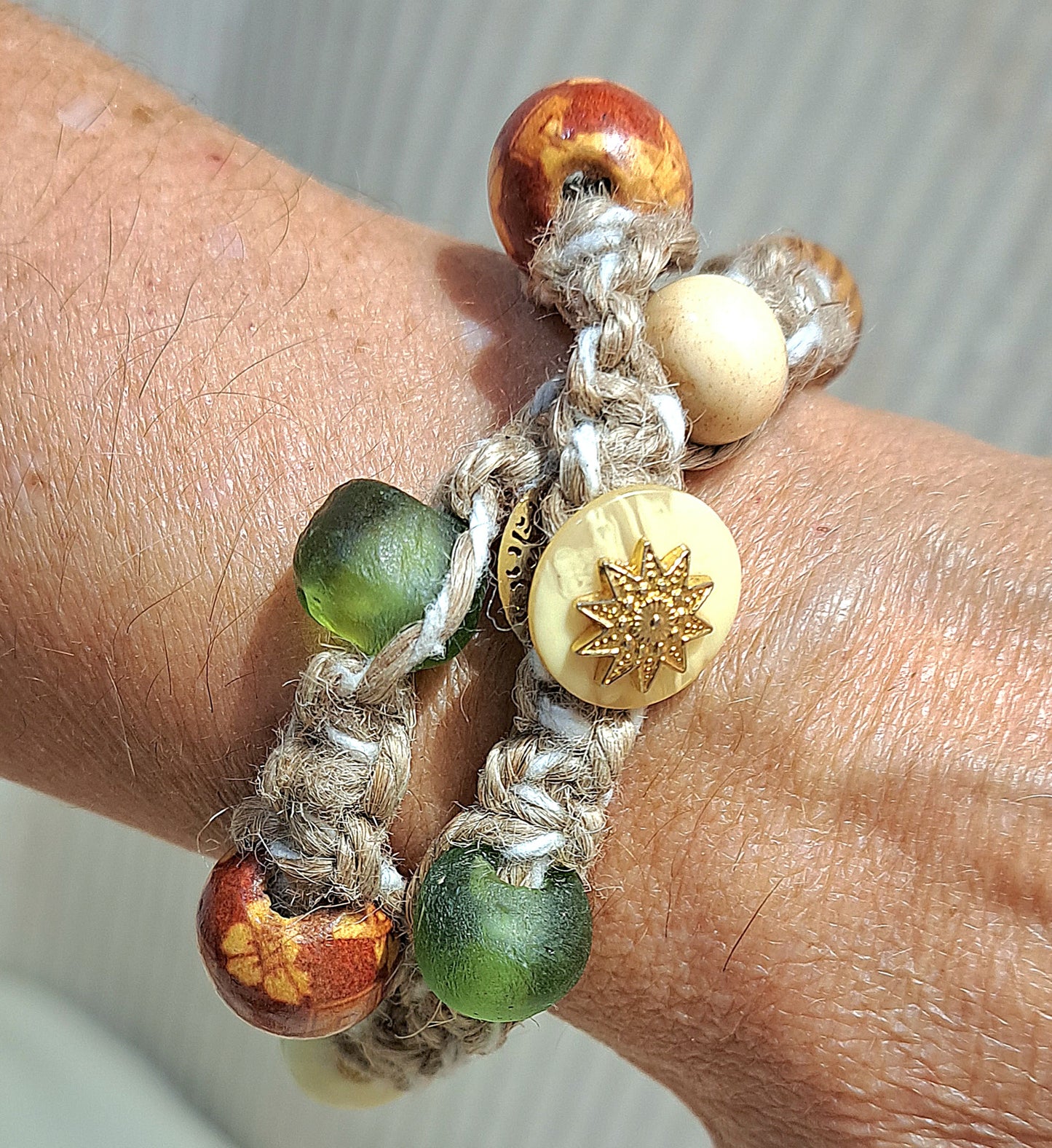 Natural double wrapped jute bracelet with African recycled glass and etched bakelite beads.