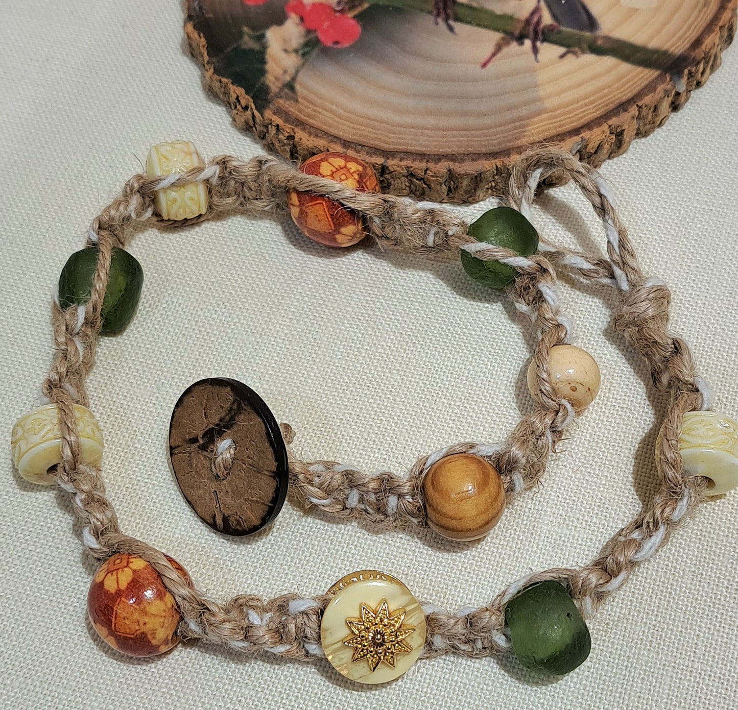 Natural double wrapped jute bracelet with African recycled glass and etched bakelite beads.