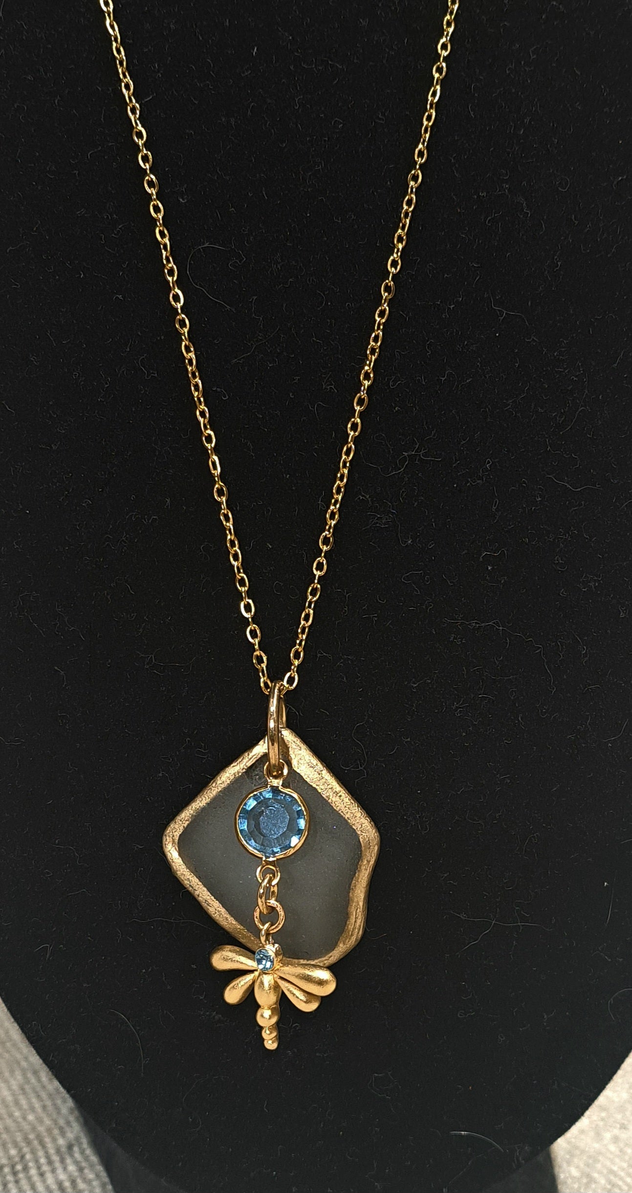 Clear Sea Glass Gold Foil pendant with blue glass charms on gold cable chain.
