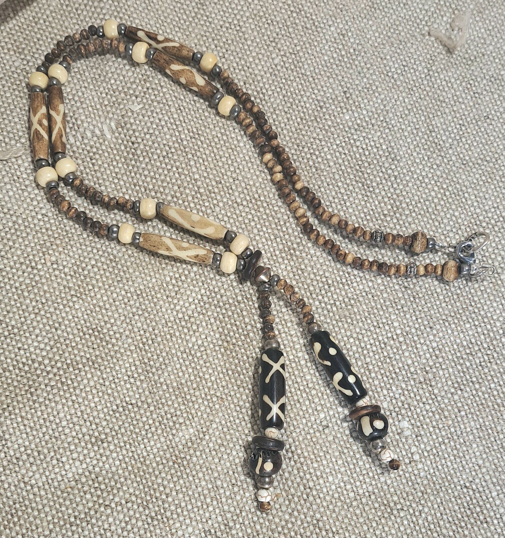 Ladies African inspired neutral beaded necklace with batik painted bone tube beads