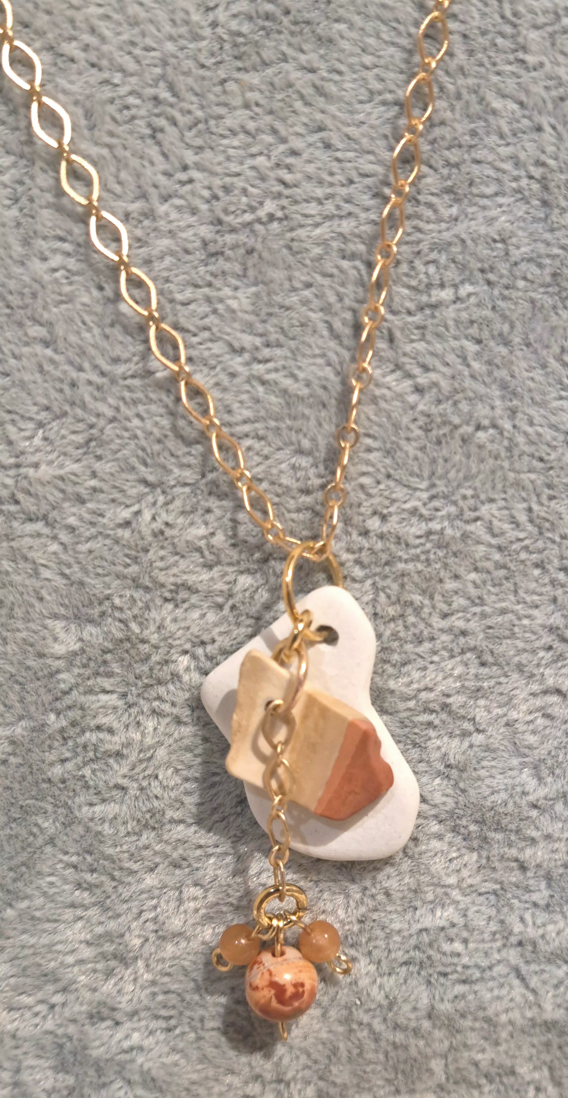 Caymanite chip with white sea glass tile on triangular gold chain