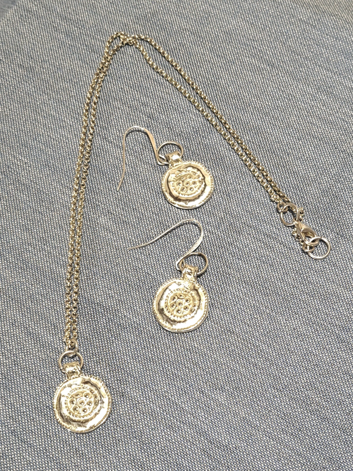Ladies silver coin necklace and earring set