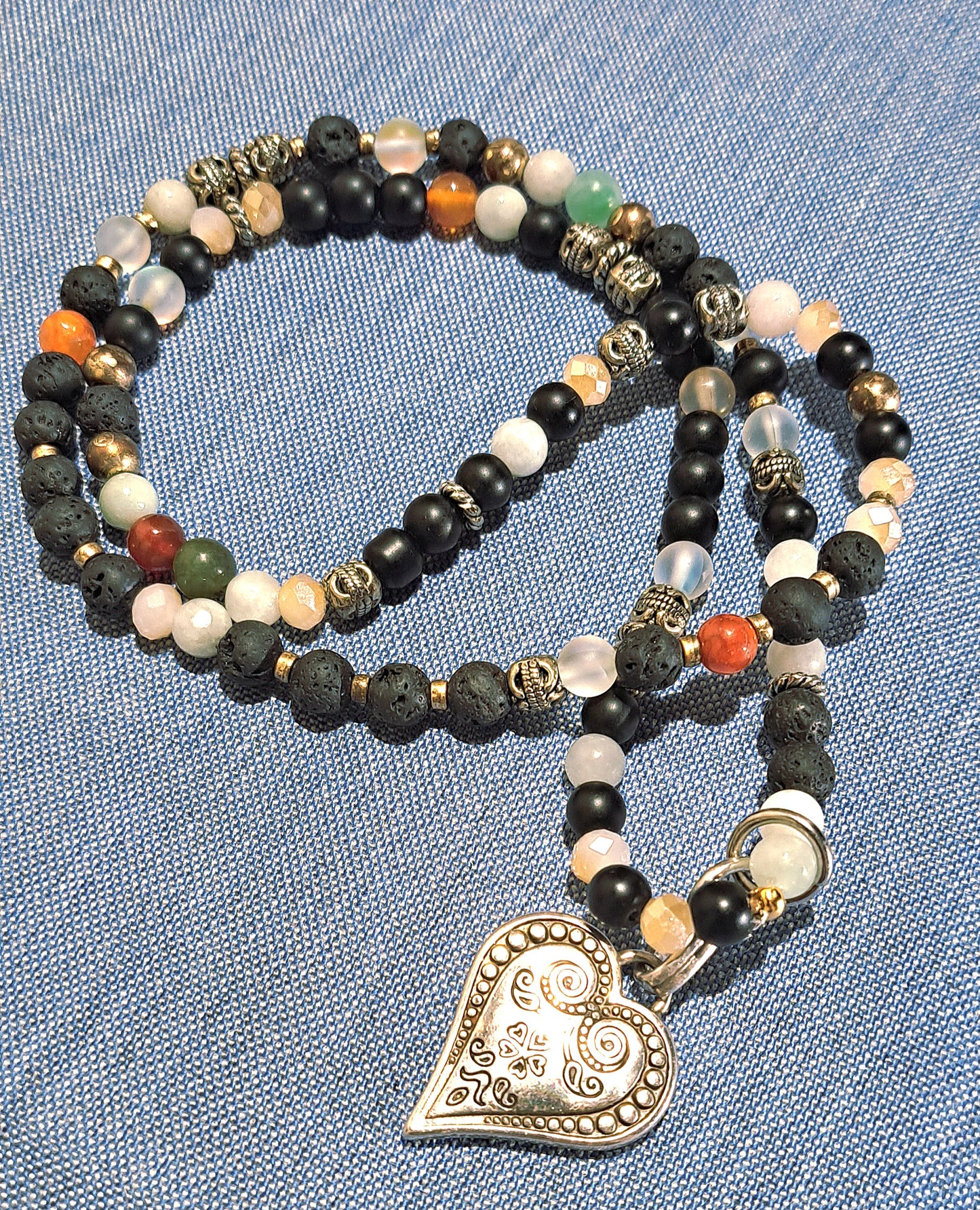 Ladies stretch multi beaded necklace with large heart charm