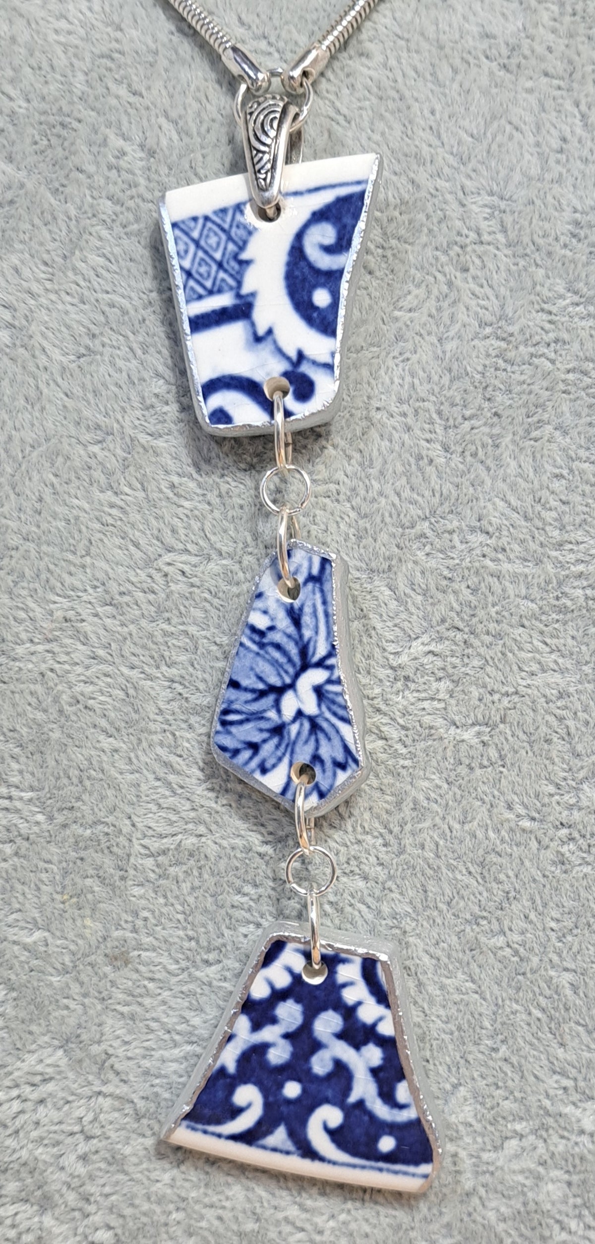 Three piece Broken China Flow Blue pendant necklace on sterling snake chain.