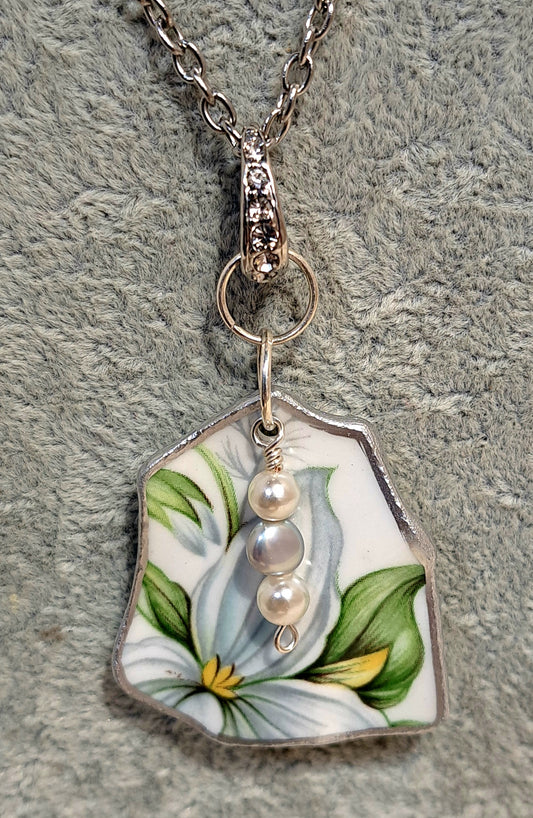 Broken china Trillium floral  pendant from sparkling bail.