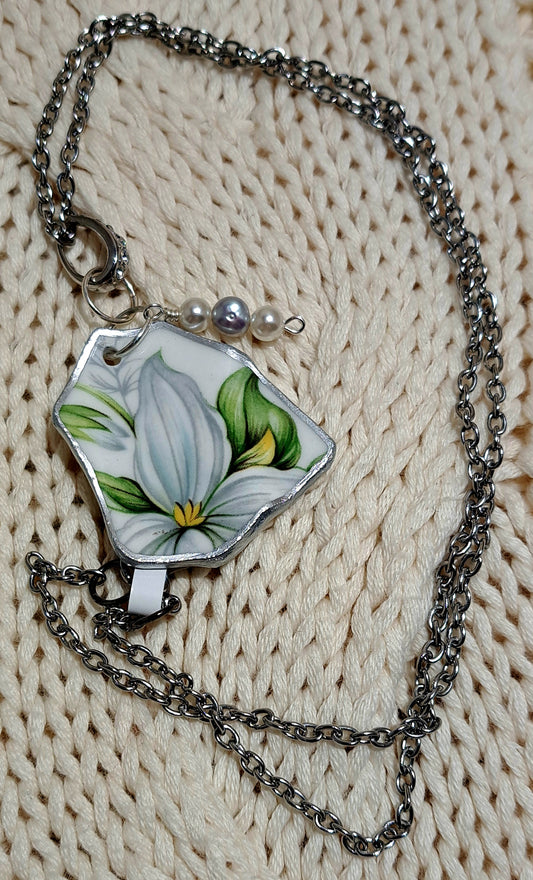 Broken china Trillium floral  pendant from sparkling bail.