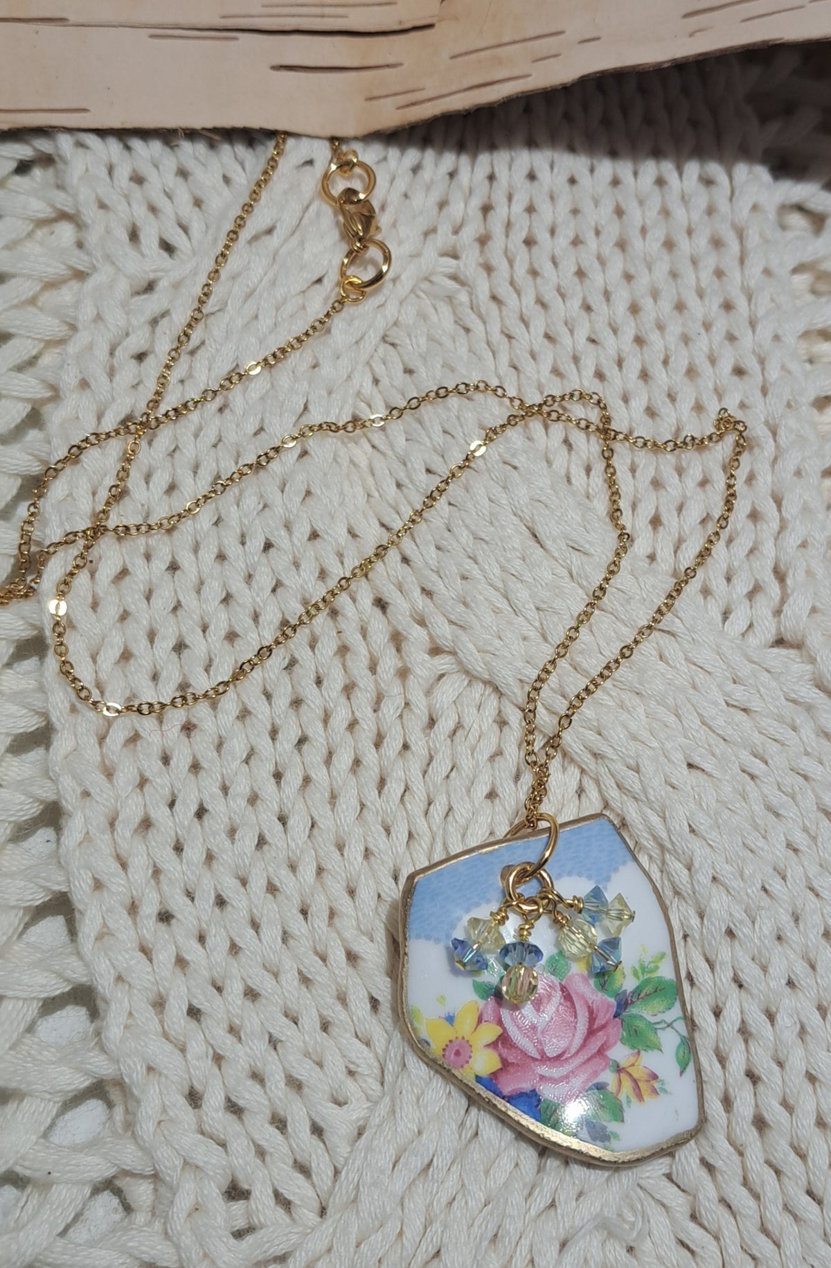 Broken China Floral with blue/white lace edge