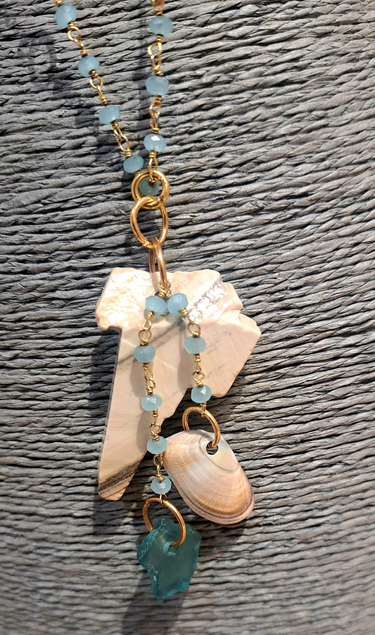 Caymanite rock necklace with  sea shell and sea glass on gold chain