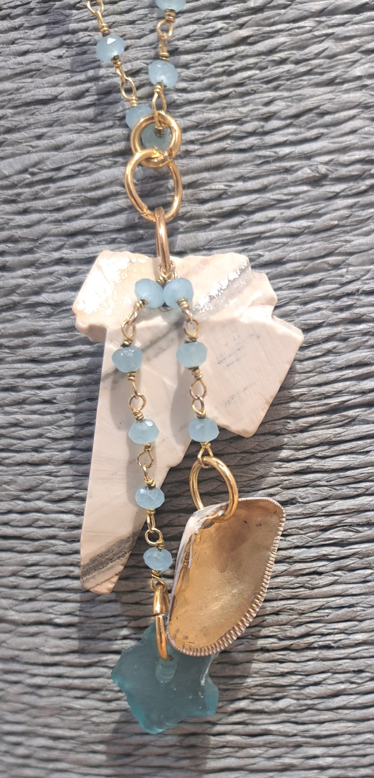 Caymanite rock necklace with  sea shell and sea glass on gold chain