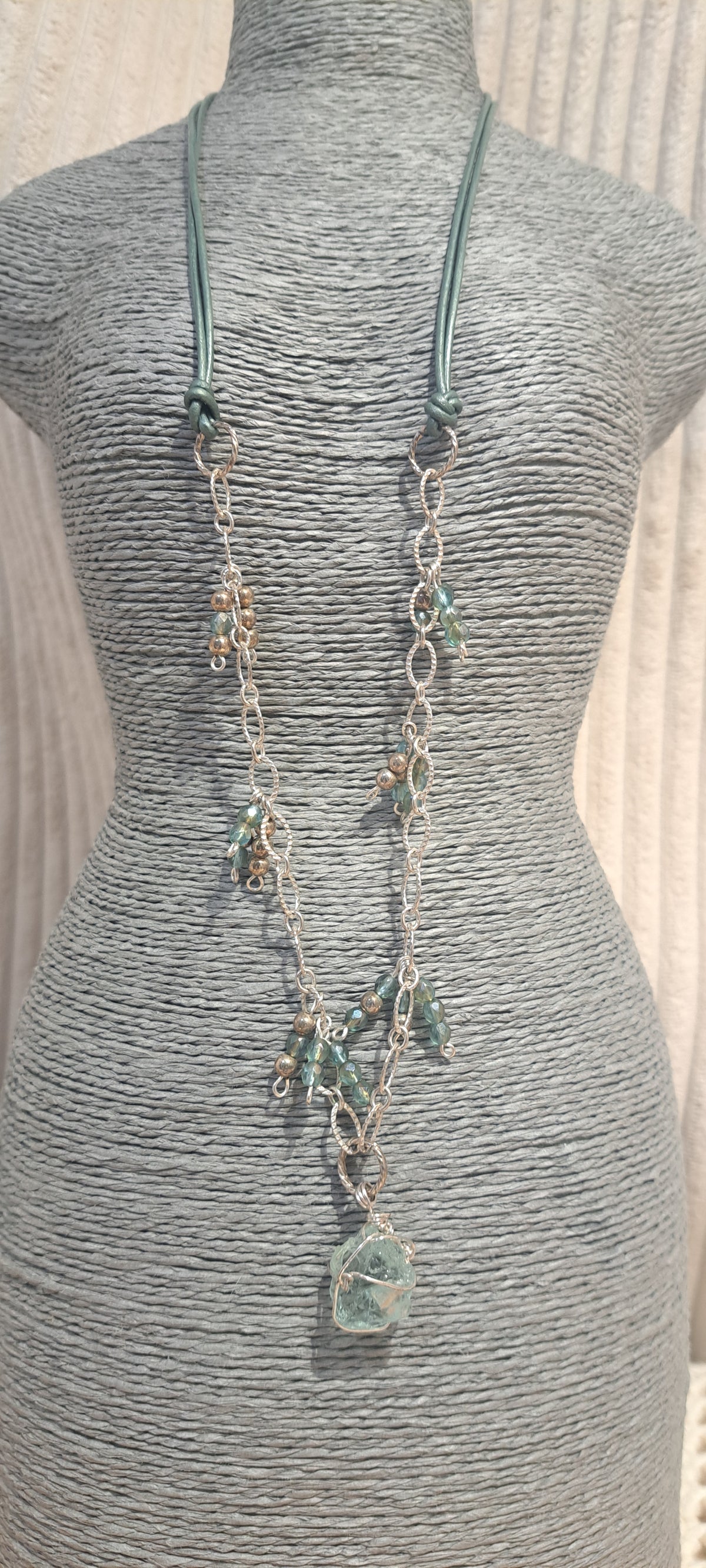 Green leather necklace with horse eye silver chain and green seed beads and green glass focal