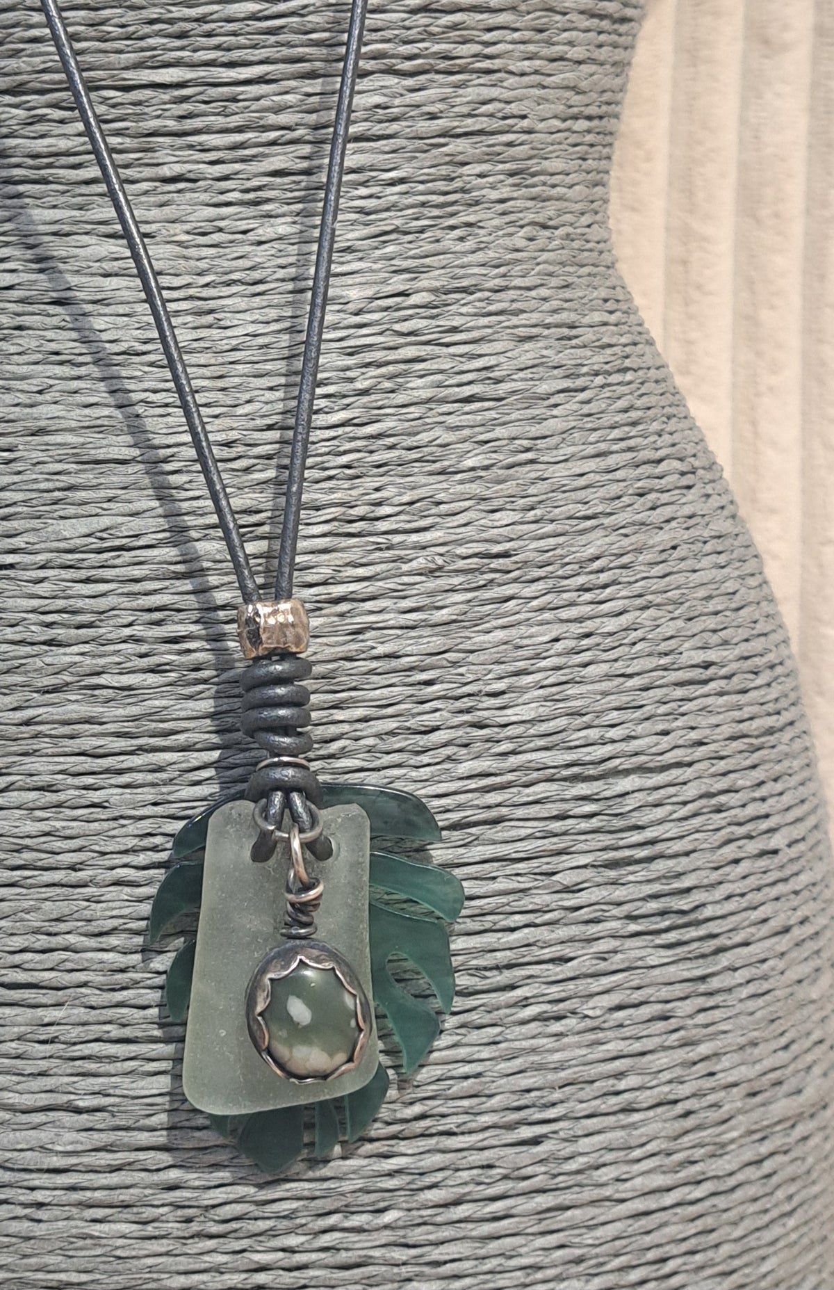 Leather slide knot adjustable necklace with leaf and pewter charm