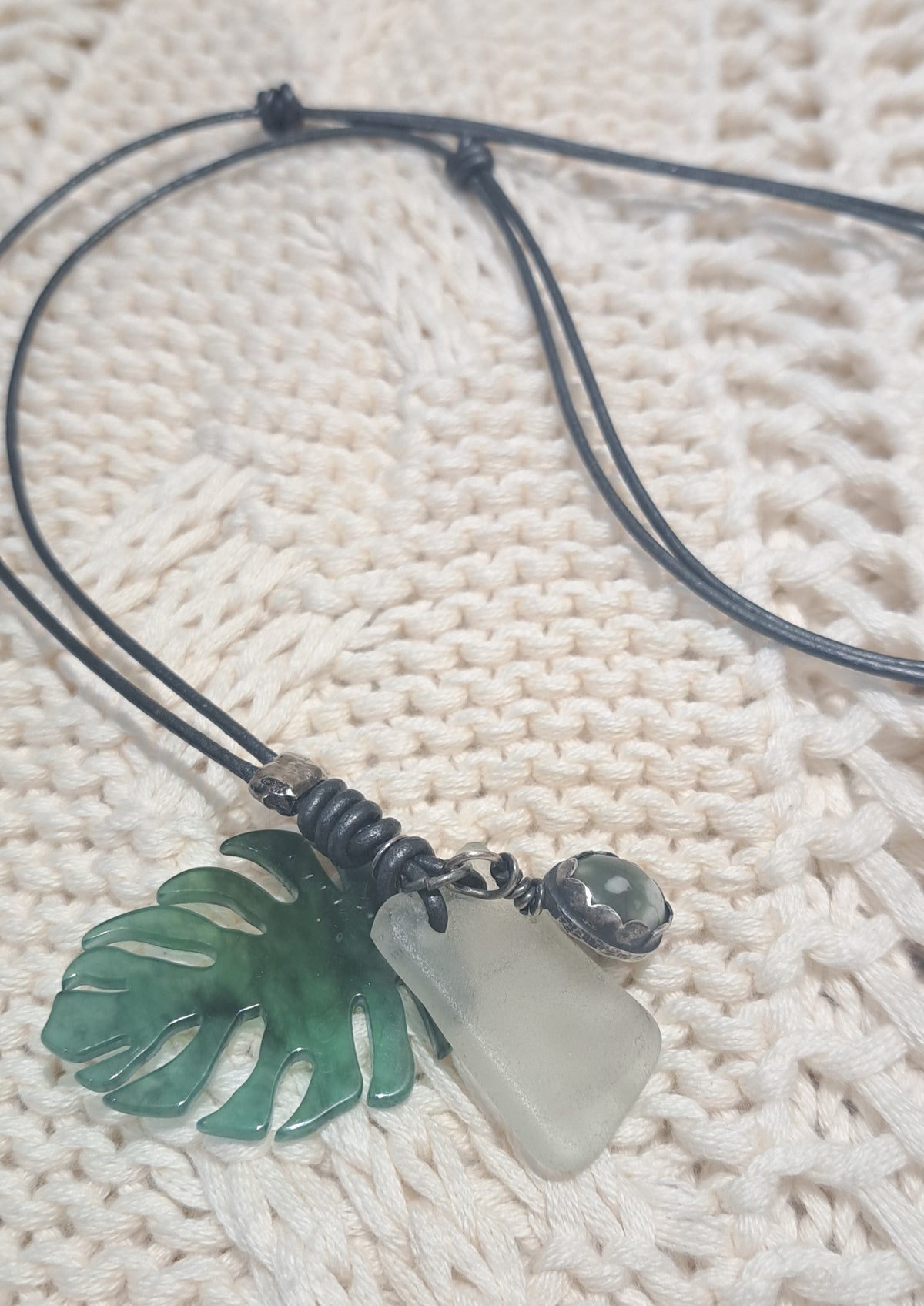 Leather slide knot adjustable necklace with leaf and pewter charm