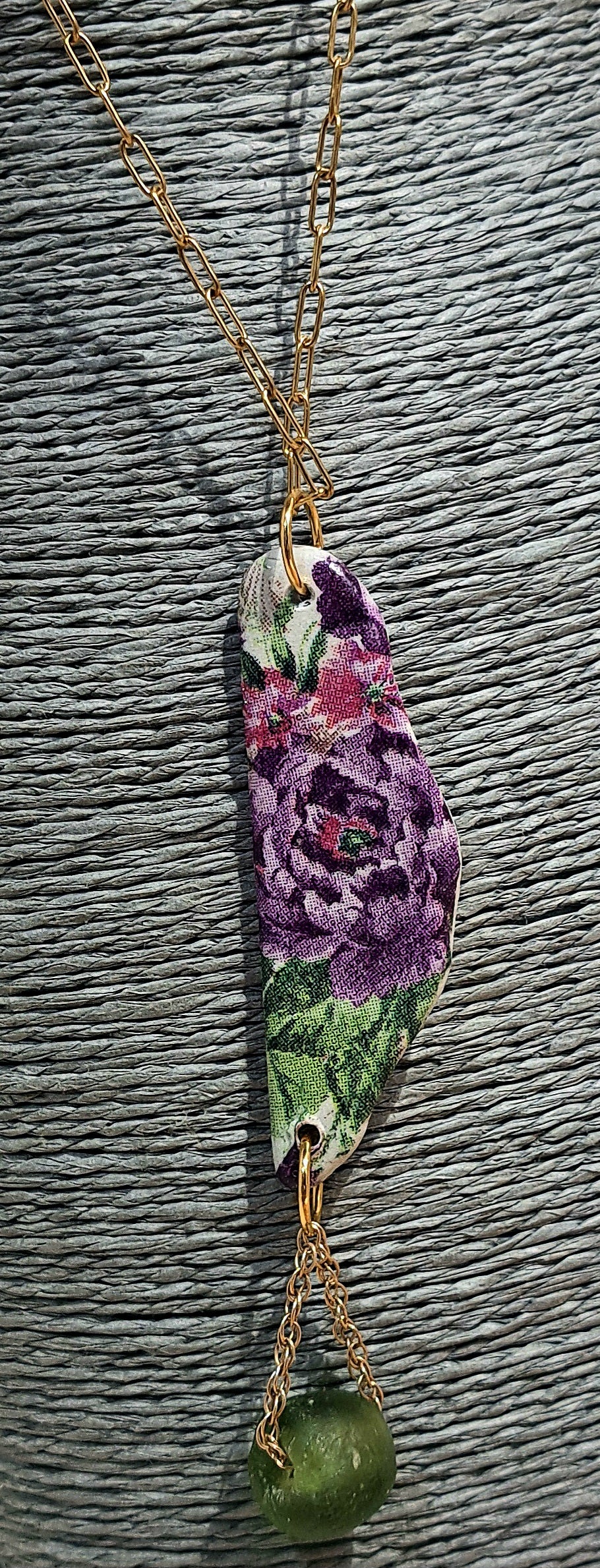 Appliqued stone floral reversible pendant necklace in purple and greens